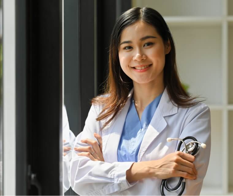 portrait-of-female-doctor-in-white-coat-with-steth-2023-11-27-05-01-30-utc (1)